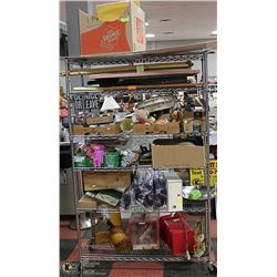 RACK OF UNCLAIMED MERCHANDISE. PROCEEDS TO GO TO