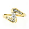 Image 1 : 14kt Yellow Gold 0.70 ctw Marquise Diamond Solitaire Bypass Ring w/ Baguette Acc