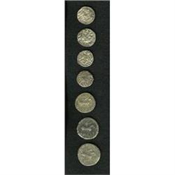 Lot of seven Central Asian silver coins. Includes: Indo 