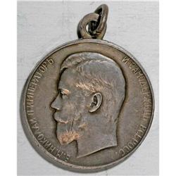 A pair of Nicholas II government silver medals, awarded 