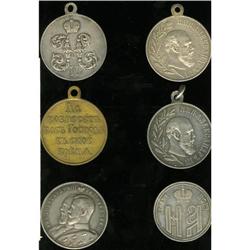 A lot of small medals as follows: (2) 27 mm silver meda 