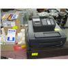Image 1 : CASIO ELECTRONIC CASH REGISTER (PCR 7290) WITH A BOX OF ASSORTED TAPE, THERMO ROLLS, SALES BOOK ETC.