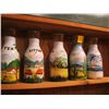 Image 1 : 5 PAINTED LITTLE TEX WINE DECANTERS