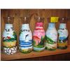 Image 1 : 5 LITTLE TEX WINE DECANTERS