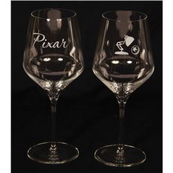 Set of (2) Pixar Wine Glasses.