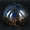 Image 1 : PAPERWEIGHT: Smoke-colored unsigned paperweight with a sea of small bubbles contain a small white ma