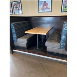Booth Seating included 24x48 inch double pedestal table and two upholstered bench seats with blue ba
