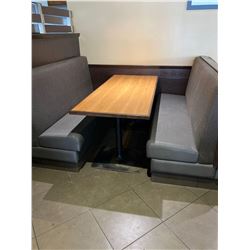 Booth Seating included 24x50 inch double pedestal table and two upholstered bench seats with grey ba