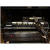 Image 5 : Rack of all audio video components including power amps, cable boxes, modems, etc