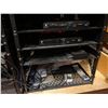 Image 9 : Rack of all audio video components including power amps, cable boxes, modems, etc
