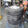 Image 1 : Set of four goodyear nordic p185/65 R15 tires on multi bolt rims
