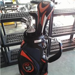 E21 GOLF CART BAG AND ASSORTED E21 AND CLEVELAND CLUBS