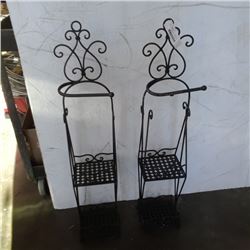 2 decorative metal; toilet paper holders