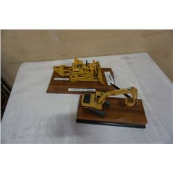 CATERPILLAR AND EXCAVATOR FIGURES MOUNTED ON BOARDS