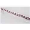 Image 1 : Ruby and diamond bracelet; 40 oval bloo