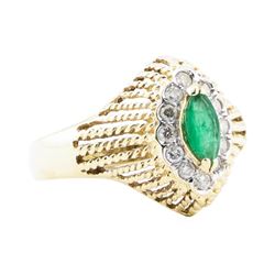 0.65 ctw Emerald And Diamond Ring - 14KT Yellow And White Gold