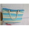 Image 2 : Beach Lot: 2 Towels, Striped Tote Bag, 2 Paddles, Lotion & Tan Mesh Bag
