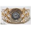 Image 1 : WOMENS ELEGANT CUFF STYLE WRIST WATCH- GOLD TONE/
