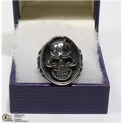 NEW SKULL RING SURROUNDED BY BLACK