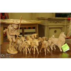 SET OF HAND CARVED WOODEN SHEEP WITH SHEPERD AND