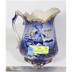 ANTIQUE DUTCH FLOW BLUE AND GOLD TRIMMED PITCHER