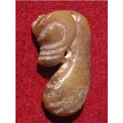 Neolithic period jade carving in shape of a #1322403