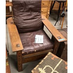 Antique wood and leather recliner with stitched Ottoman