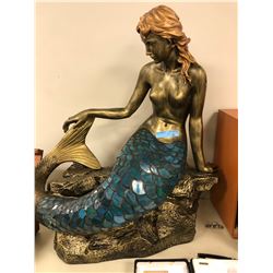 One stained glass and molded Mermaid