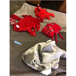 3 red lobster and 1 silver shark toy
