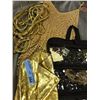 Image 2 : Golden mermaid costumes complete with fin and bead necklaces, earrings and other jewelry