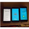 Image 1 : 1 LG Android Smartphone. 1 Motorola Android Smartphone, 1 Polaroid Smartphone