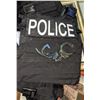 Image 1 : lot of assorted character worn police uniforms, pictures, badges (Movie Prop)