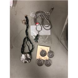 A silver sterling ring, 2 silver sterling necklaces and 2 pairs of silver sterling earrings