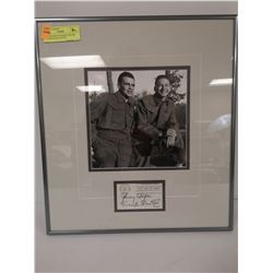 AUTOGRAPHED FRAMED WAYNE AND SHUSTER PICTURE
