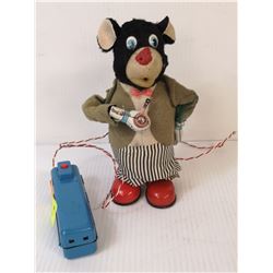 1950S TINPLATE SMOKING BEAR TOY