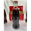 Image 2 : 6 Full C.C. Bottles Mixed Xmas, Santa, Original. Original Carrier
