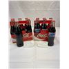 Image 2 : 6 Full Embossed Bottles with Carrier 1990's + 6 Full 2005 American Idol Coca Cola Bottles with Origi