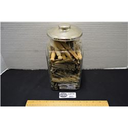 Antique Candy Store Counter Jar with Lid filled with vintae Clothes Pegs