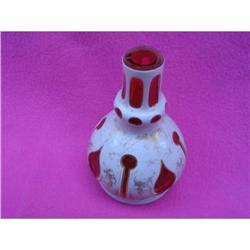 Red glass  vase with creamy white accents #1337660