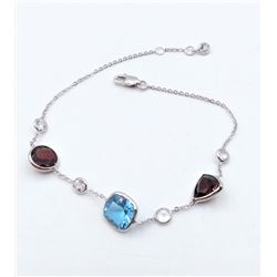White Gold & Blue Topaz,Garnet & White Sapphire Bracelet