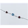 Image 2 : White Gold & Blue Topaz,Garnet & White Sapphire Bracelet