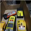 Image 2 : Box of laser levels and stud finders