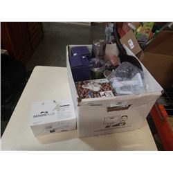 Box of slicer/peeler, hersheys fondue set, pancake pan, water bottles and more