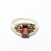 Image 1 : Lady's 10K Yellow Gold Garnet Ring with Diamond Accents - Size 8 1/2. Total weight of 3.28 grams.