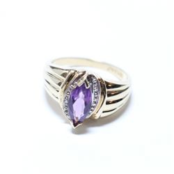 Lady's 10K Yellow Gold Amethyst Ring with Diamond Accents - Size 7.  Total weight of 3.22 grams.