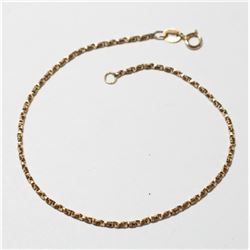 10K Yellow Gold Twisted Box Chain Bracelet with Spring Ring Clasp. Measures 7 1/4" in length with a 