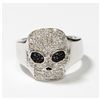 Image 1 : Solid Sterling Silver Pave Style Skull Ring with Expandable Band. This statement rings contains an e