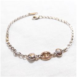 Lady's 10K White & Rose Gold Bracelet - Measures 7 1/4" in length with a weight of 2.18 grams.