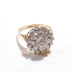 Lady's 10k Cubic Zirconia Cluster Style Ring - Size 7 3/4.  Total weight of 3.15 grams.