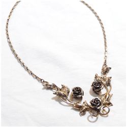 Lady's Sterling Silver BOND BOYDE Floral Lavelier style necklace. Measures approx.. 15.5" in length 